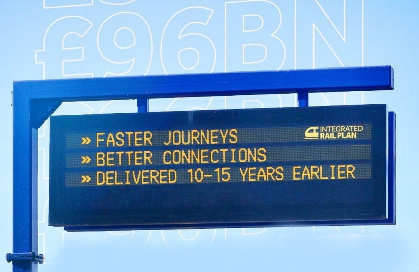 Railway signage depicting Government improvements to local rail
