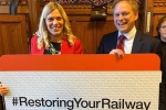 Miriam Cates MP with Grant Shapps holding a giant railway ticket